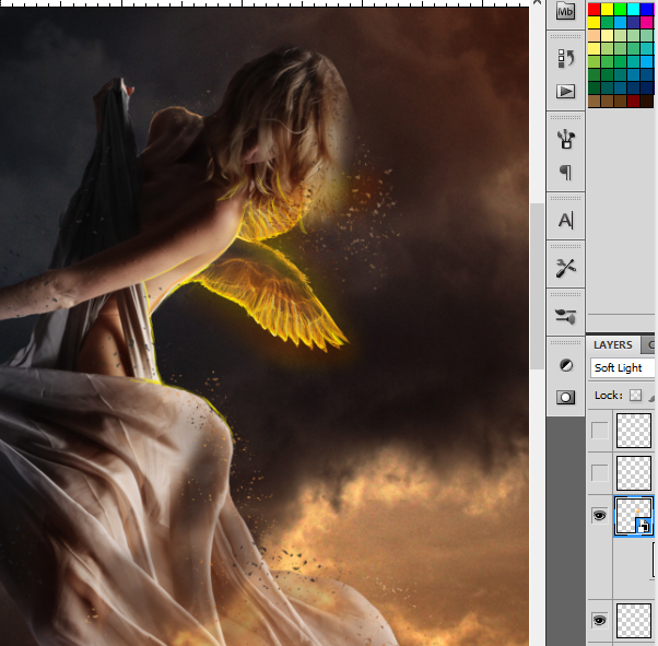 Photoshop合成在乌云密布中飞舞的天使