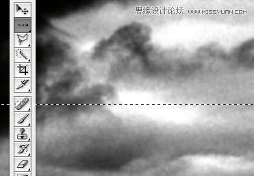 Photoshop给图片添加穿透云层的光线